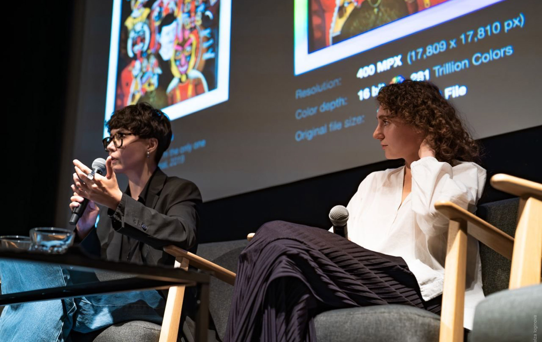 Anna Filippova and Yuliia Berdiiarova on stage with Q&A session of Digital Original during Digital Art Mile event. Basel, Switzerland. (June 2024).